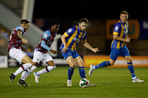 Matthew Pennington of Shrewsbury Town and Josh Cullen of Burnley (AMA)