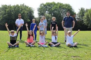 Councillor Shaun Davies, Councillor Ian Preece, Headteacher Jo Weichlbauer and Business Manager Selina Mahy with children from Ladygrove School