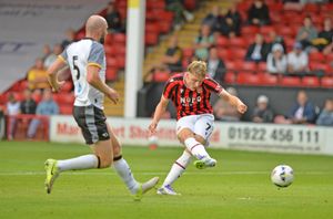 Bournemouth loanee Jonny Stuttle restores Walsall's lead just before half-time.