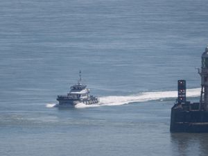 A group of people thought to be migrants are brought into Dover, Kent, onboard a Border Force vessel following a small boat incident in the Channel in April