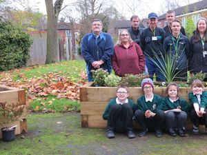 Supporting image for story: Planters brighten up derelict play areas