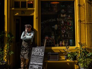 Richard Cook outside the shop