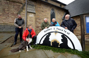 Shed members, along with Ruth the rescue dog, with their creation at St Mary’s Church, Cleobury Mortimer
