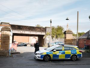 Supporting image for story: Police tape off homeless shelter car park after incident in Shrewsbury