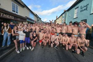 Scores of people stripped down to take part in the fundraising run.