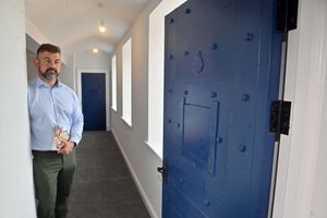 Liam Floyd behind the hefty cell door