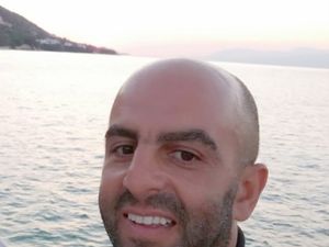 Supporting image for story: Onboard train worker who tried to protect others has always been a hero – family