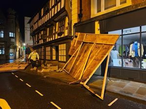 The hoardings blown from Llwyd Mansion. Photo: Chris Langston