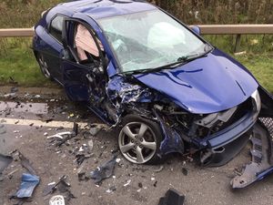 A car was badly damaged. Picture: @bloxwichfire