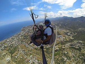 Taking flight – Ozgur takes Kirsty paragliding