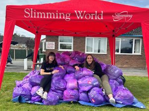 Supporting image for story: Slimmers raise thousands for charity as they donate clothes that no longer fit