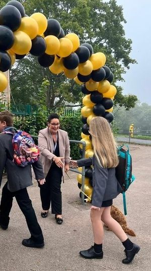 The Hart School's principal, Rachael Sandham, greeting every new pupil alongside therapy dog Rufus.