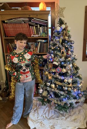 Kathryn enjoying decorating the Christmas tree
