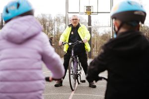Youngsters taking part in a children's cycling training session with Instructor Nick Jenko.