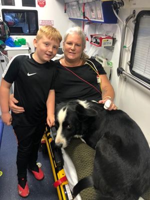 Jakob and mum Sally in the ambulance with Drift the Border Collie