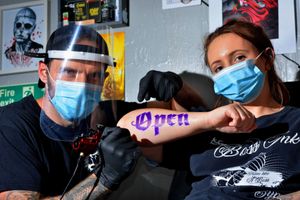 Mike Wilx, owner of Boss Ink Tattoo Studuis, with Sam Pryce from St Georges in Telford