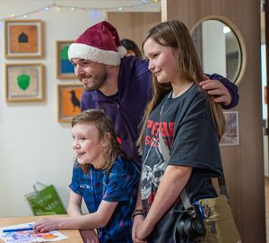 Villa's John McGinn meets families at Acorns. 