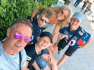 Former Wolves hero Craddock with wife Shelley, and their three boys Joseph, aged 15, Luke, 13, and Toby, 10