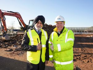 Councillor Bhupinder Gakhal, City of Wolverhampton Council Cabinet Member for Resident Services, and Rob Lashford, Director at Speller Metcalfe, on site as the foundation works get underway on the Bilston Outdoor Market redevelopment