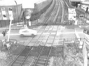 Supporting image for story: CCTV shows speeding gunman on the run