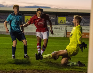Ollie Holden has a shot saved during Whitchurch Alport's 6-3 defeat to Radford in the FA Vase (Picture: Liam Pritchard)