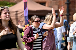 Revellers at Shrewsbury Castle watching Loopfest on Sunday