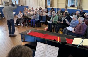 The choir hard at work