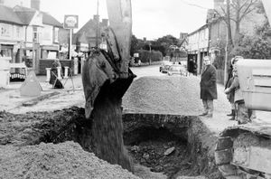 Supporting image for story: 'Feeling blue about a badge? Online applications raise alarms about exclusion' - Your Letters and a burst watermain in 1969 that caused chaos in a rural village - a picture from the archives