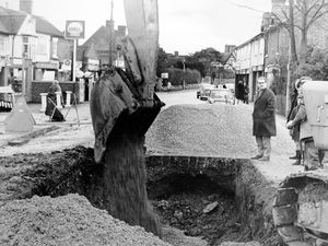 Supporting image for story: 'Feeling blue about a badge? Online applications raise alarms about exclusion' - Your Letters and a burst watermain in 1969 that caused chaos in a rural village - a picture from the archives