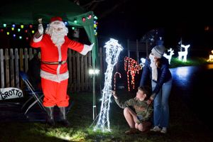 Oak Meadow C of E Primary School have created a Winter Wonderland trail around the school field. With Santa is Jake Jones 9 and Sarah Jones