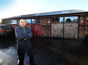 Supporting image for story: 'Ganged up on' garage owner distraught after being ordered to tear down workshop