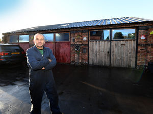 Supporting image for story: 'Ganged up on' garage owner distraught after being ordered to tear down workshop