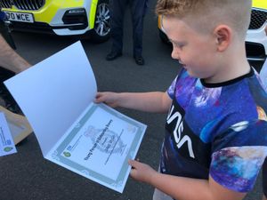 Jakob with his award for bravery