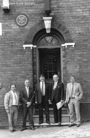 Unveiling a blue plaque at the building are TCS members Barry Whitehouse, Joshua Churchman, John Brimble, Ron Statham and Neil Statham.