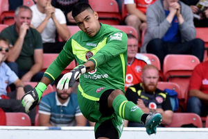 Goalkeeper Neil Etheridge in action for Walsall