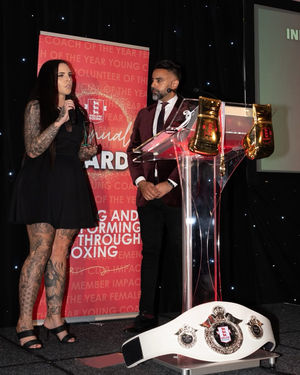 Lindsey receiving her award