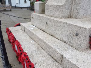 Supporting image for story: White poppies torn down from Knighton war memorial