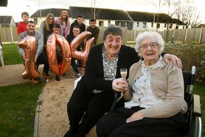 Hilda Cross celebrating turning 104 with her daughter Joyce Boneham, her grandchildren and great-grandchildren: Sam Wright, Andrea Birch, Stewart Kirkbride, Max Wright, Lauren Birch, Megan Birch, Alex Kirkbride and Oscar Wright