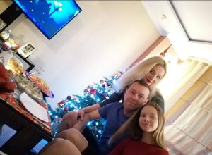 Alexey Putzinia, with wife Katya and daughter Ksenia 