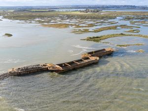 Supporting image for story: National Trust sinks three barges to form new island for birds