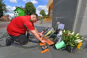 Scarves, cards and flowers were placed in memory of Diogo Jota