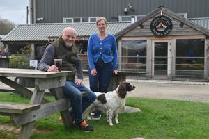Shane and Alison Parr and Lachi welcome people into the brewery