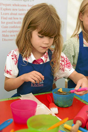 Young chef Isobelle Standell giving a demonstration