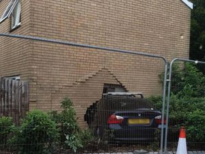 Supporting image for story: Man, 21, arrested after car crashes into Telford house