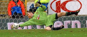 Former Wolves goalkeeper Paul Jones pulls off a trademark save during his second spell at Molineux.