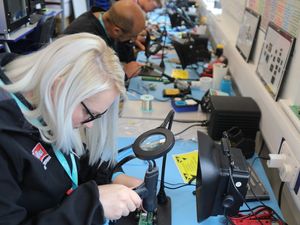 Supporting image for story: Muller Dairies and Denso teams put soldering skills to the test at Telford College 
 