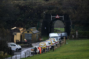 Network rail engineers' vehicles are pictured near to where an Avanti West Coast train, travelling from Glasgow to London Euston sation, derailed, near Shap, north west England on November 3, 2025.