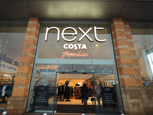 Supporting image for story: Next sales grow as shoppers get into stores again