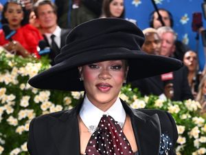 Supporting image for story: Rihanna debuts baby bump on star-studded Met Gala blue carpet