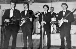 The Deltas on stage at the Music Hall on December 14, 1962. From left: Tony Wiseman, Roger Francis, Bernard Lewis, drummer Bob Partridge, right, Barry Udy on lead guitar. Note the drum kit in the background extreme right which was the drum kit of Ringo Starr  – it was such early days that the kit has Ringo's name on it rather than that of The Beatles. 